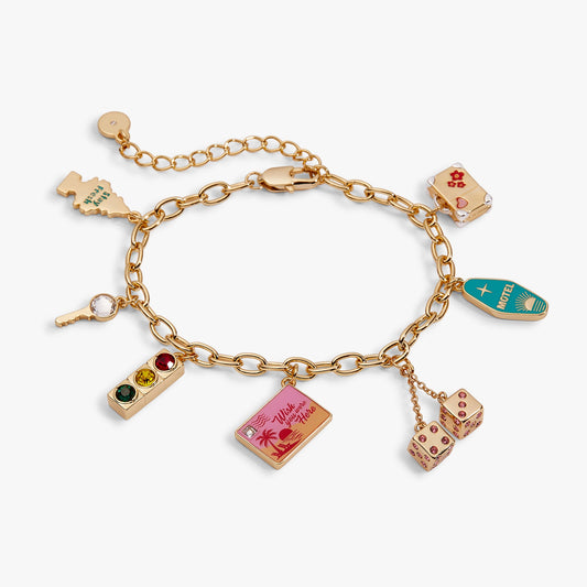 Gold ALEX AND ANI Road Trip multi-charm bracelet with travel-themed charms on a delicate chain.