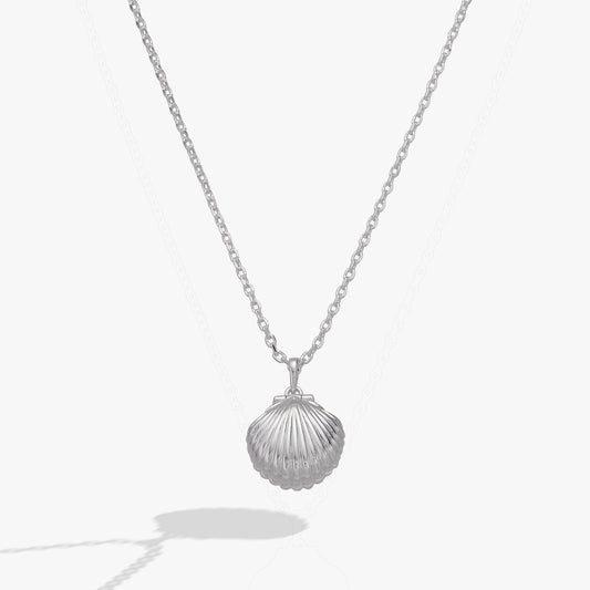 Silver Seashells Are Love Letters In The Sand locket pendant by ALEX AND ANI on a necklace, featuring a seashell design.