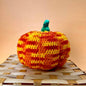 Crochet pumpkin amigurumi kit by Darn Good Yarn featuring eco-friendly yarn for fall-themed crochet decor.
