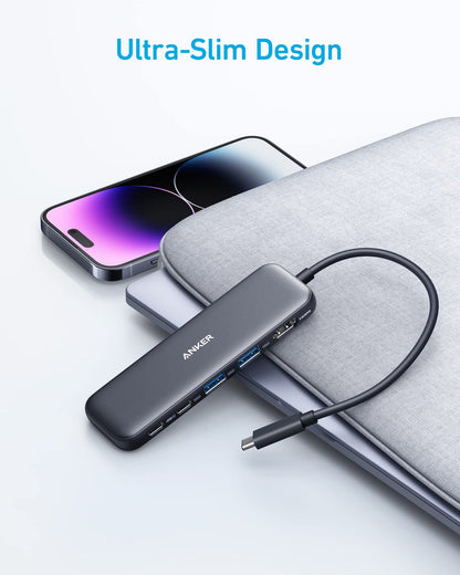 Anker 332 USB-C Hub 5-in-1 in black showing multiple ports including HDMI, USB-A, and USB-C for versatile connectivity.