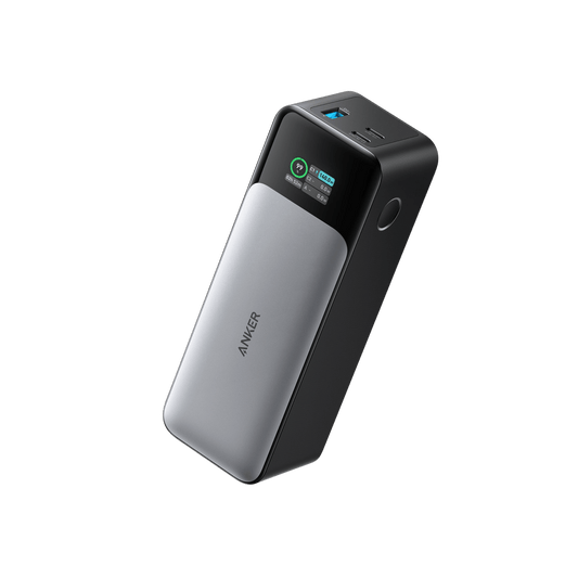 Black Anker 737 Power Bank PowerCore 24K for charging devices, featuring multiple USB ports and a compact design.
