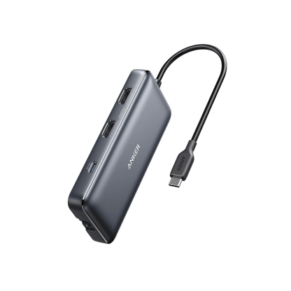 Anker 553 USB-C Hub in black showing multiple ports for charging and connectivity on a sleek electronic device.