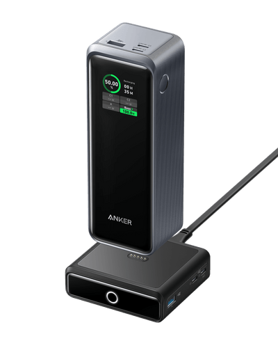 Anker Prime 27,650mAh power bank and 100W charging base, portable charging device with sleek design and multiple charging ports.