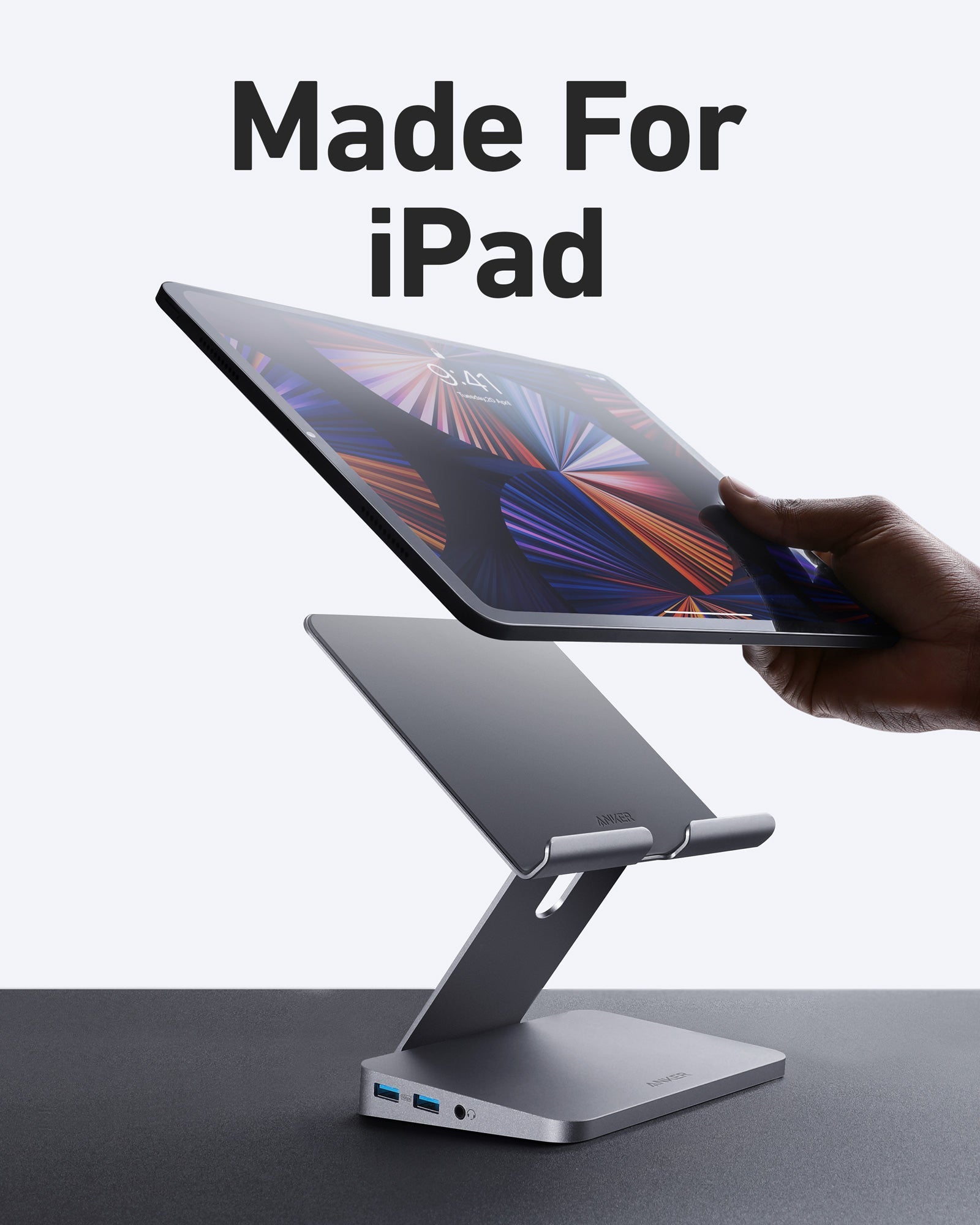 Anker 551 USB-C Hub in gray, 8-in-1 charging hub with tablet stand, connecting multiple devices for versatile charging and connectivity.