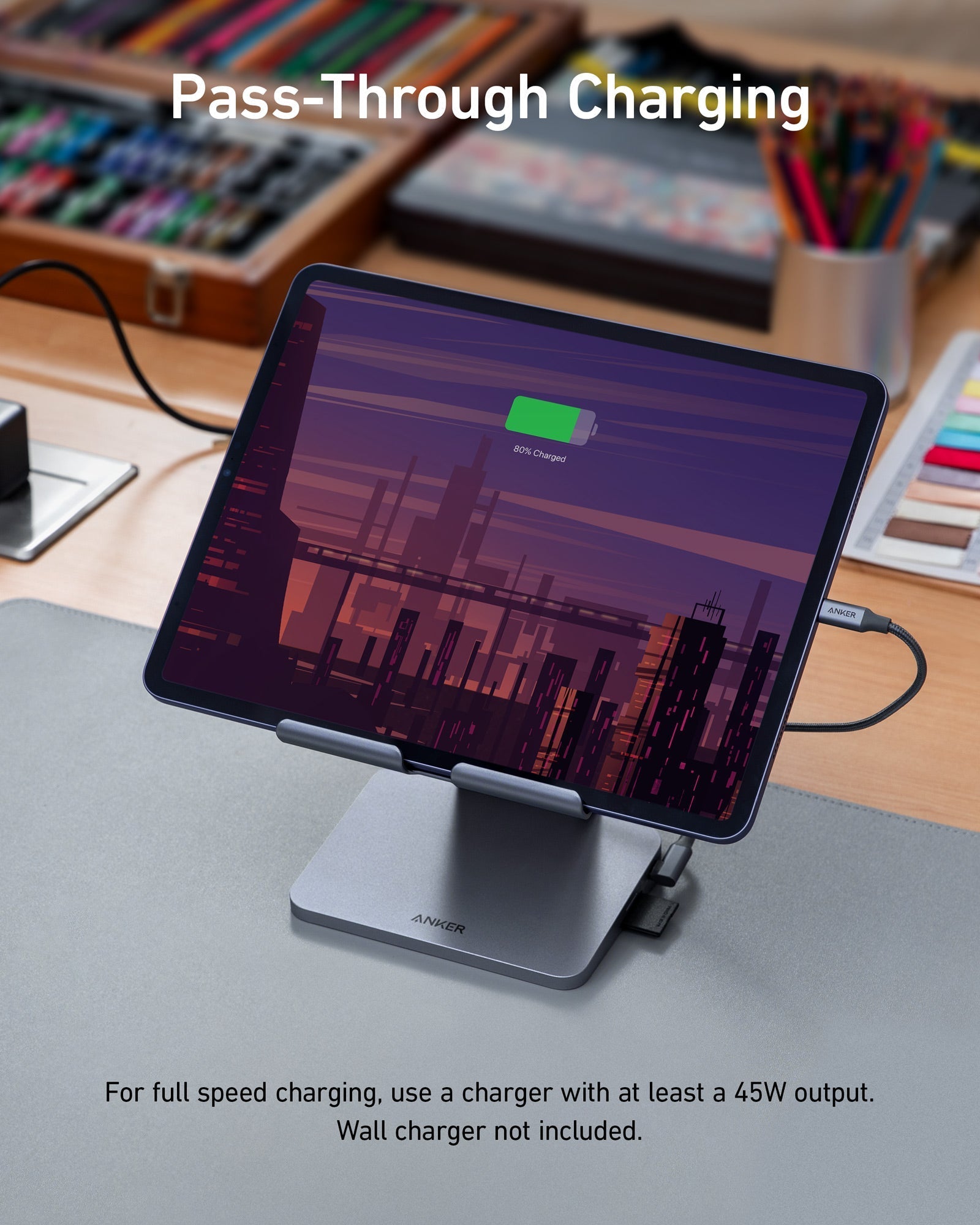Anker 551 USB-C Hub in gray with 8-in-1 ports and tablet stand, designed for charging and expanding connectivity.