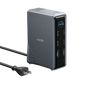 Anker Prime 14-in-1 charging docking station with dual displays and 160W power output showing multiple ports and connected devices.