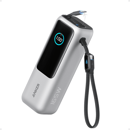 Anker 25K 165W laptop power bank in space black with built-in and retractable cables, portable power supply for laptops and devices.