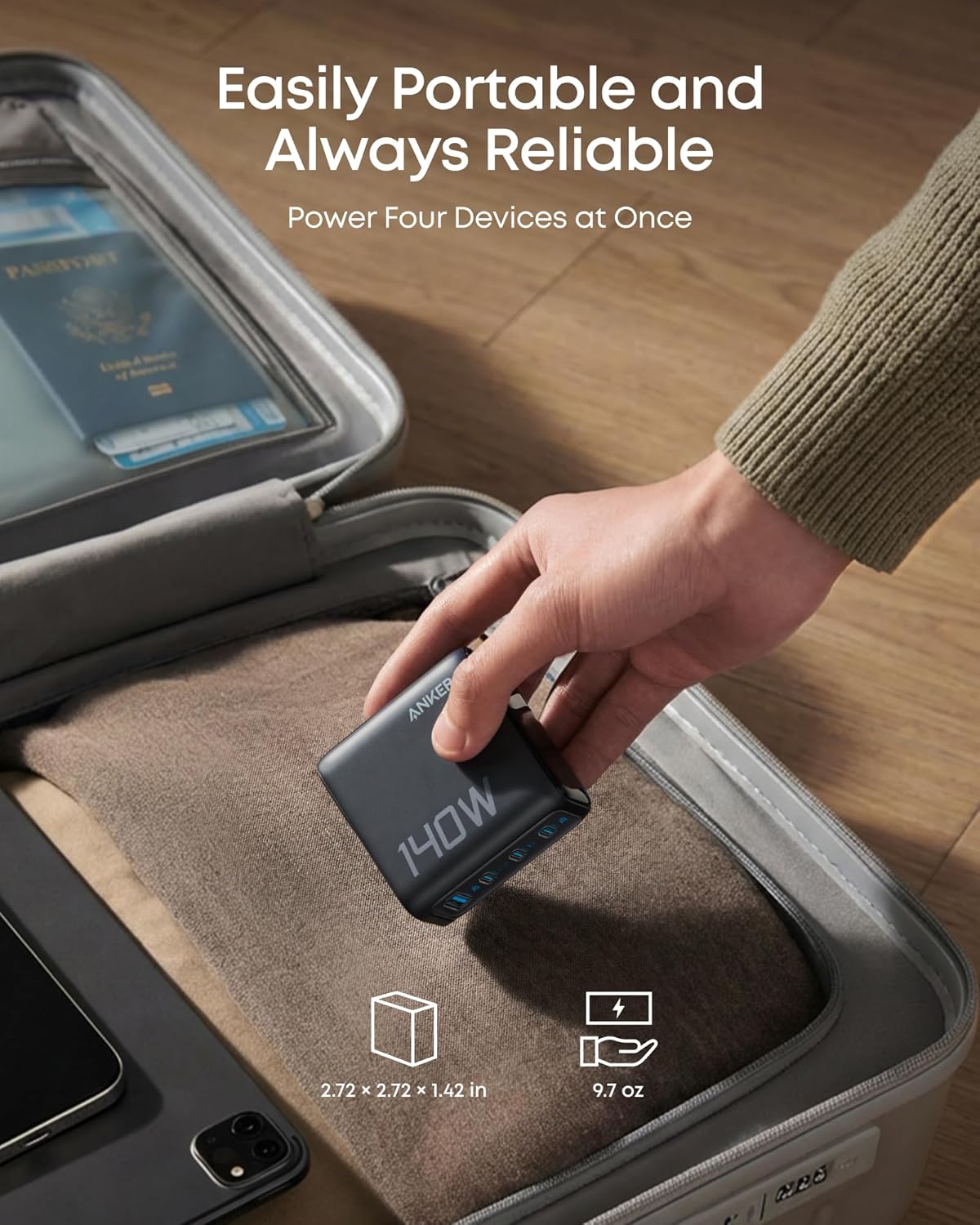 Anker 25K 165W laptop power bank with built-in and retractable cables in space black, portable for charging on the go.