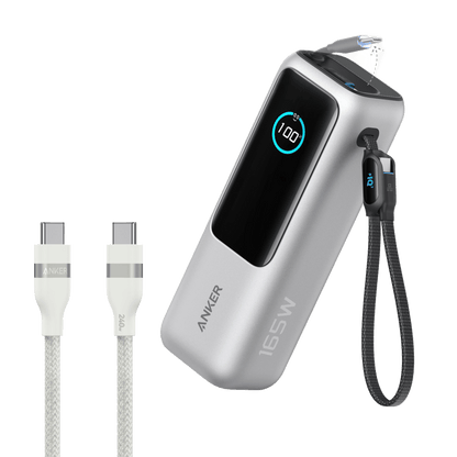 Anker 25K 165W laptop power bank in space black with built-in and retractable cables for portable device charging.