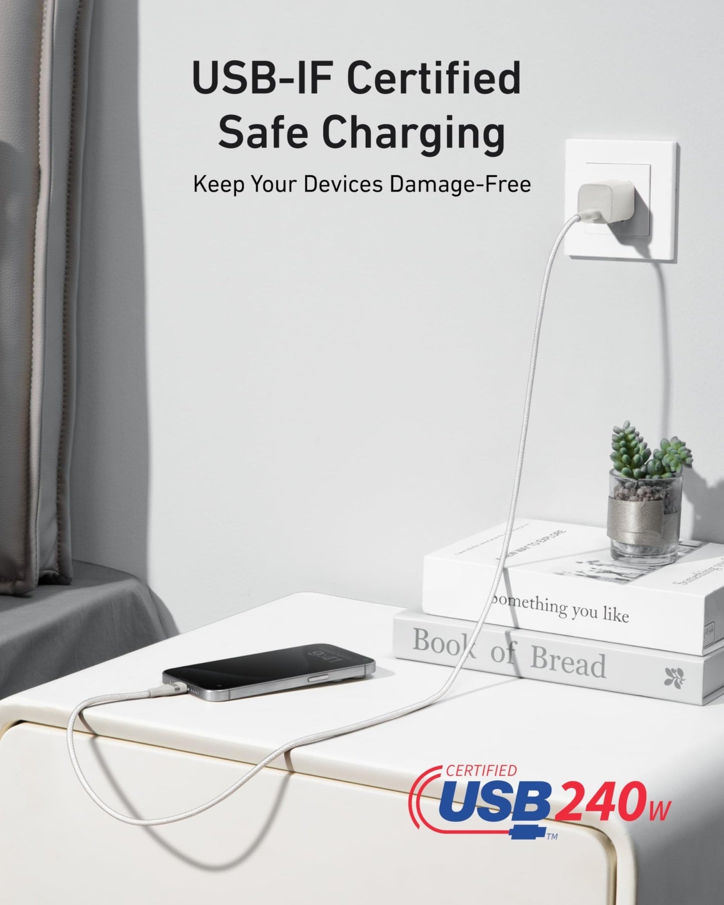 Anker 25K 165W black laptop power bank with built-in and retractable cables for portable charging.