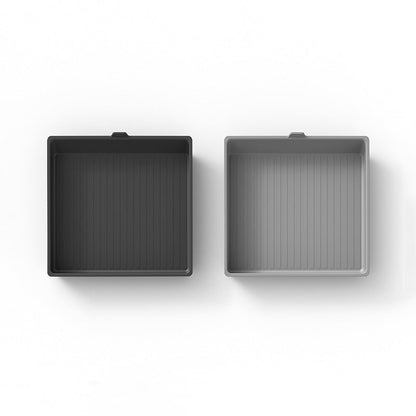 Silicone armrest box mat designed for Tesla Cybertruck, featuring a textured surface for durability and grip.