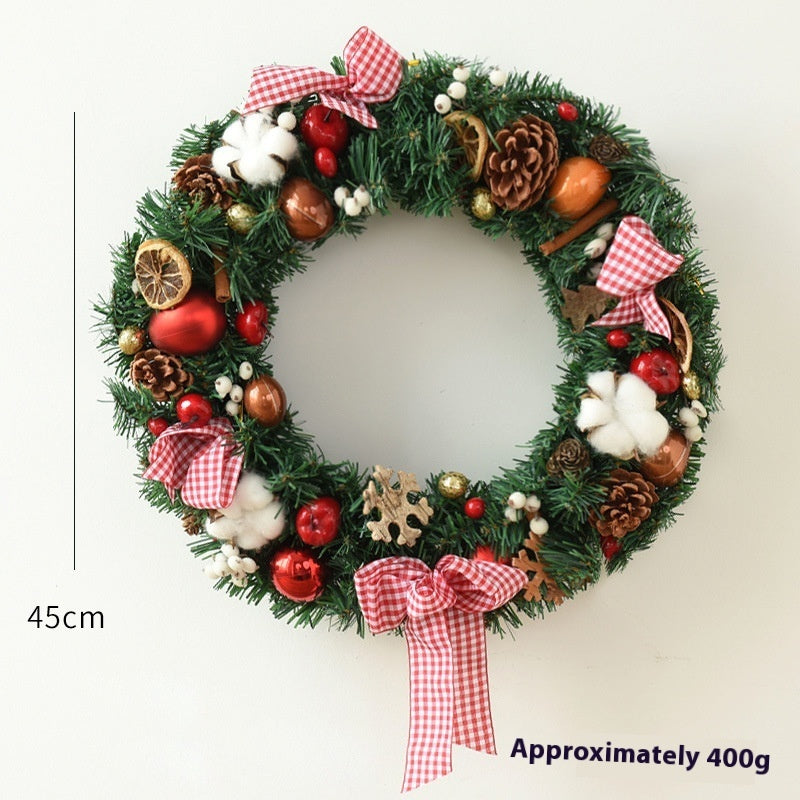 Christmas garland bow door hanging with festive ribbon and greenery for window decoration