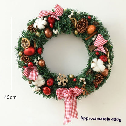 Christmas garland bow door hanging with festive ribbon and greenery for window decoration