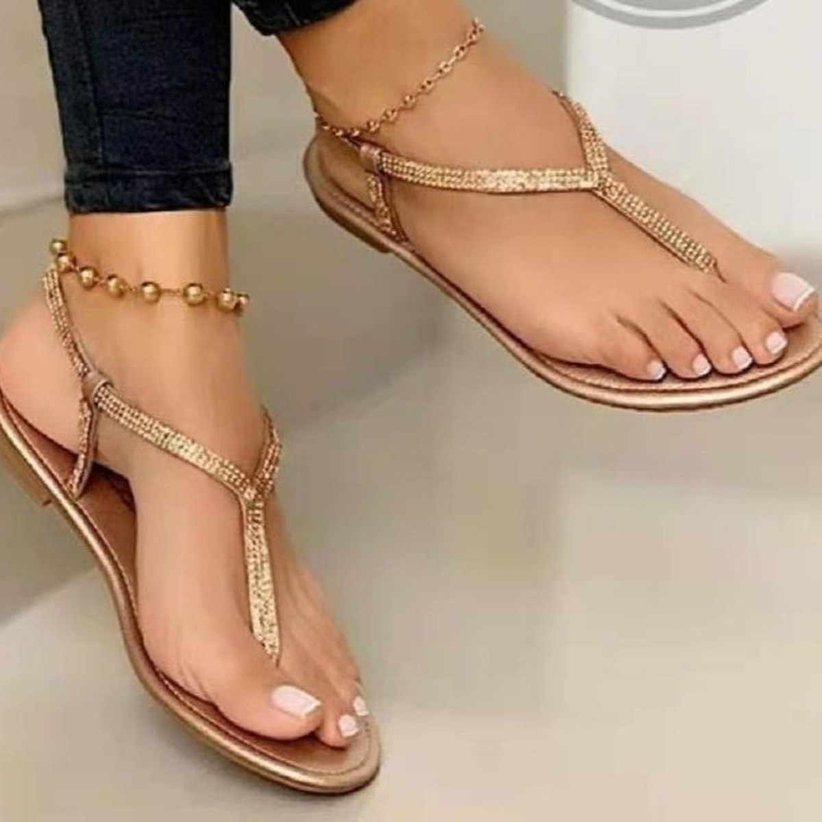 Women's designer beach sandals by BACKUPMYFILESNOW® featuring a light, sexy style with strappy design and comfortable flat sole.