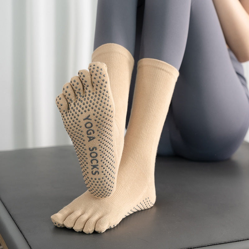 Mid-calf winter yoga socks for women in a cozy, non-slip design