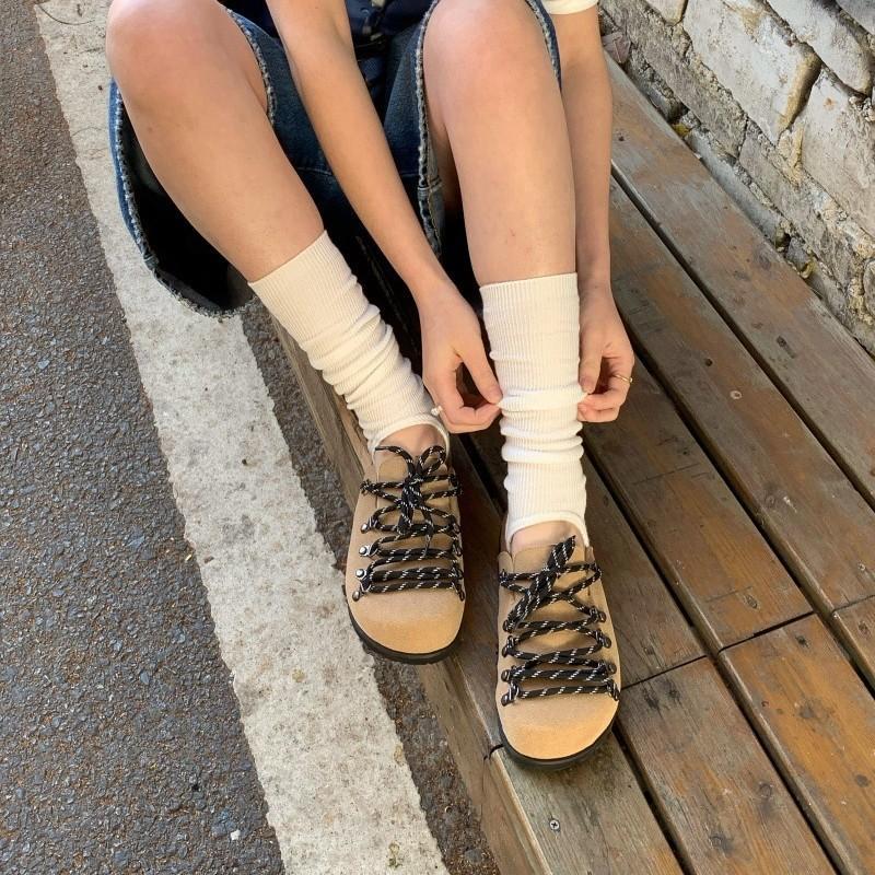 My Store strap slip-on closed-toe mules, showing the shoe design and adjustable strap detail