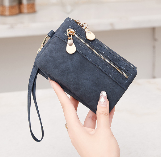 Chic women's long urban-style wallet by BACKUPMYFILESNOW® with multiple card slots and a sleek leather design.