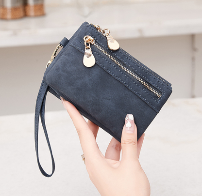 Chic women's long urban-style wallet by BACKUPMYFILESNOW® with multiple card slots and a sleek leather design.