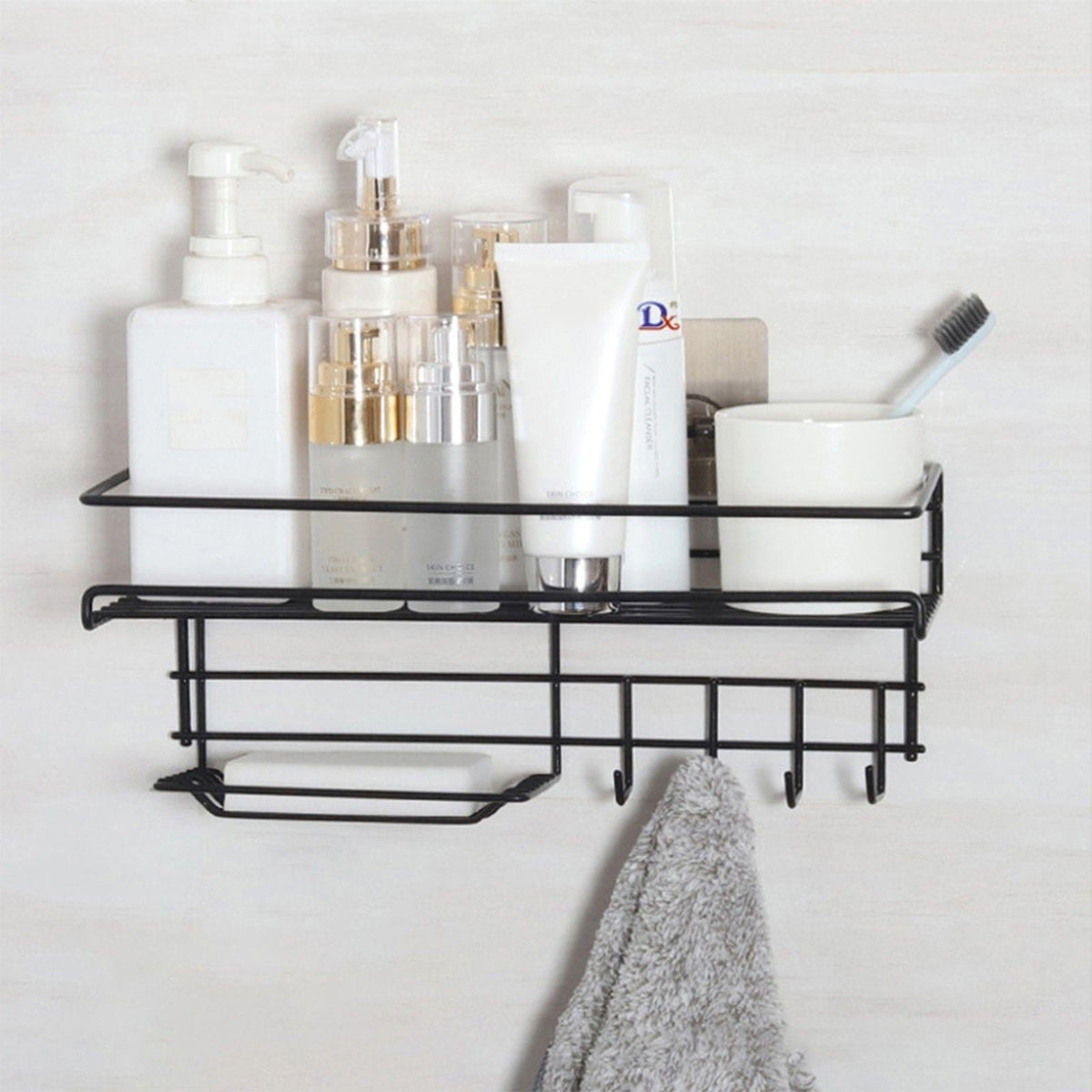 Punch-free bathroom storage rack mounted on wall, compact organizer design