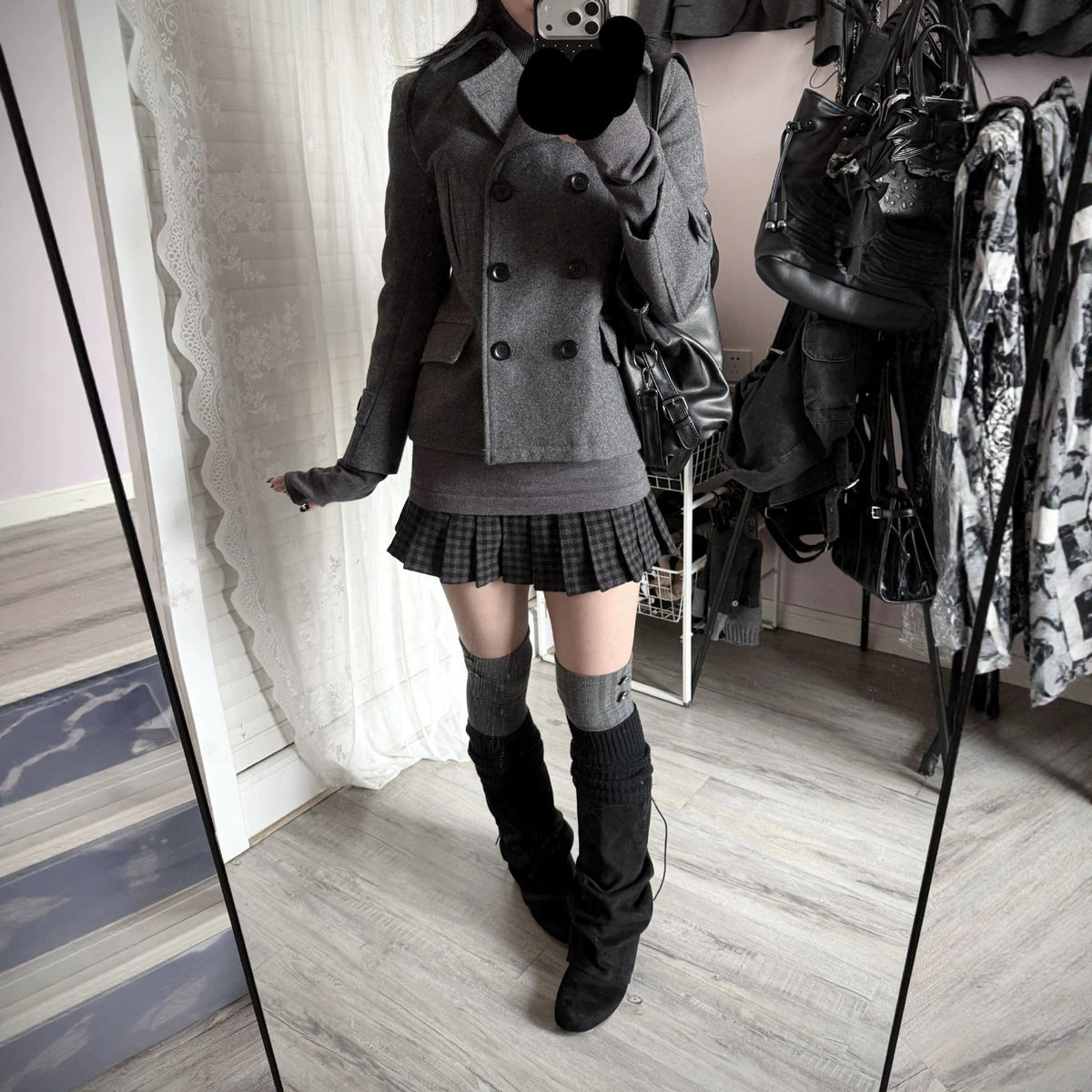 Women's short wool coat with notched lapel and double-breasted front in a structured jacket style