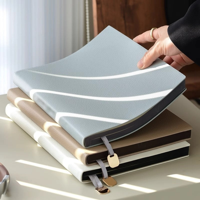 Litchi pattern soft leather covered notebook with textured cover and rounded edges