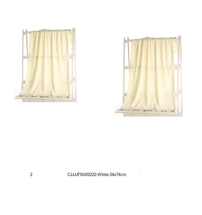 Bamboo charcoal fiber bath towel in a soft, textured weave folded neatly for display