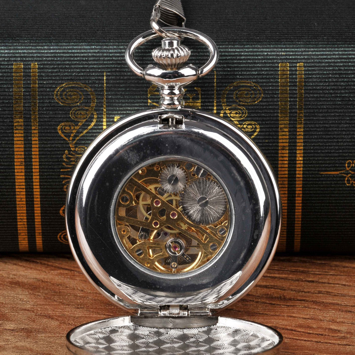 Silver large pocket watch with double-hinged case and mechanical movement