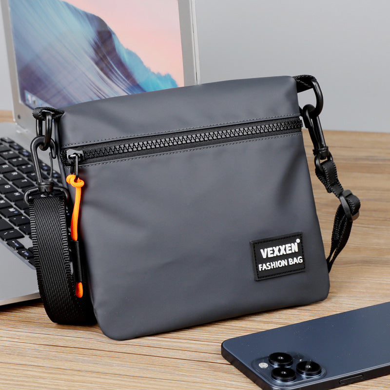 Water-resistant casual shoulder crossbody bag in a compact everyday design