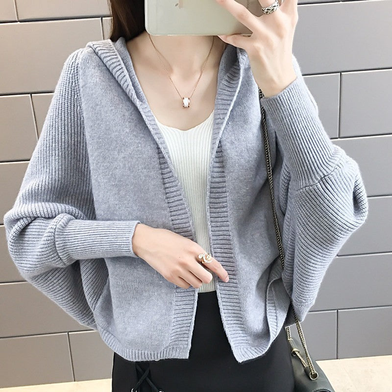 Solid-color knitted cardigan jacket for women in a classic design
