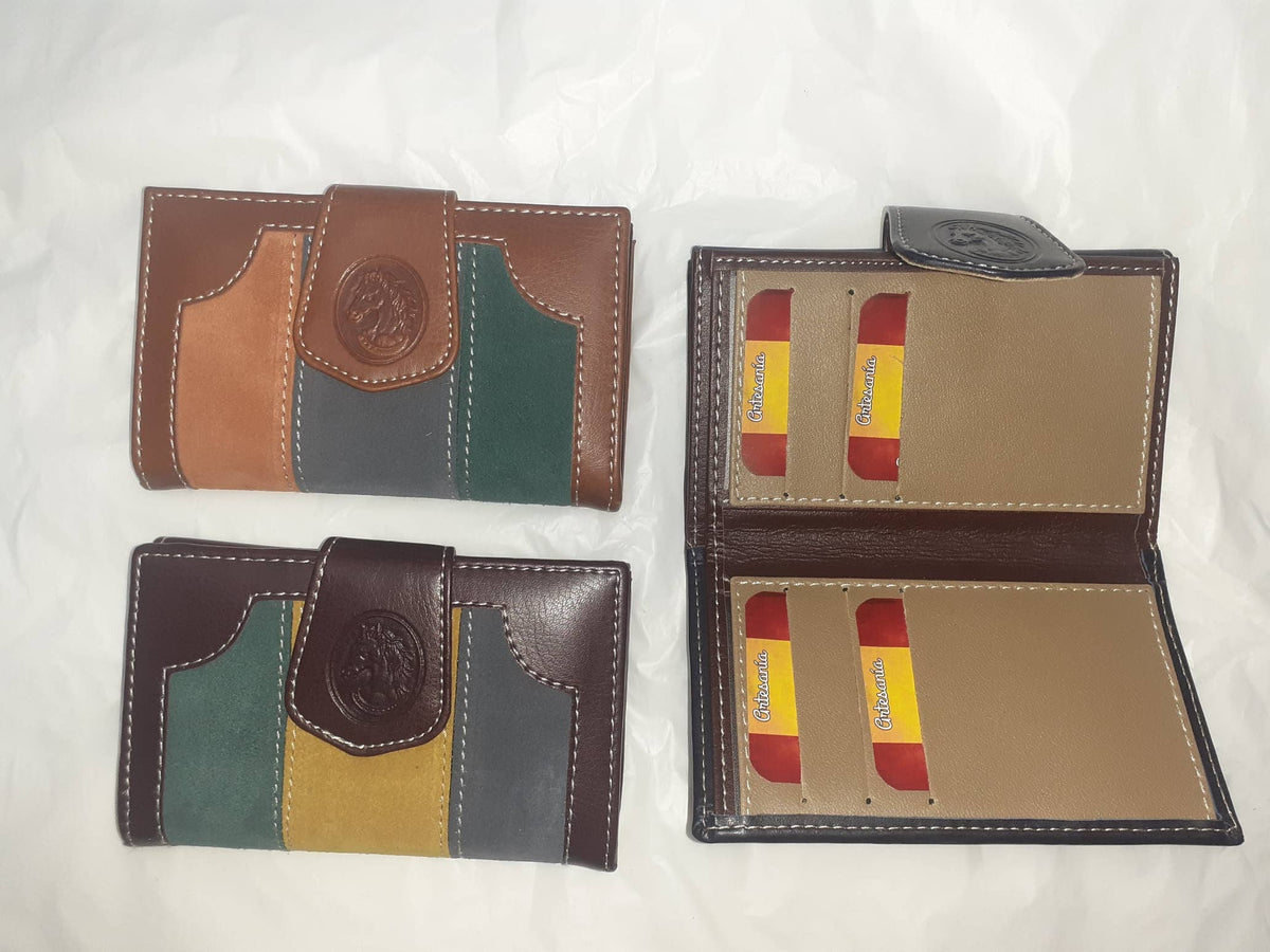 Handmade women's wallet with detailed stitching, featuring multiple card slots and a sleek leather finish.