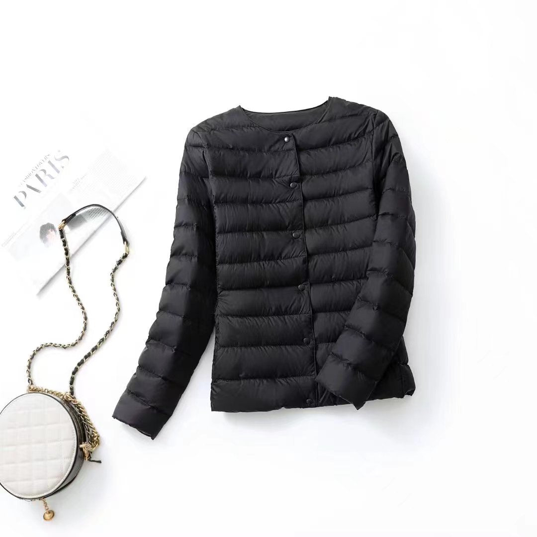 Women's lightweight white duck down jacket with quilted design and stand collar