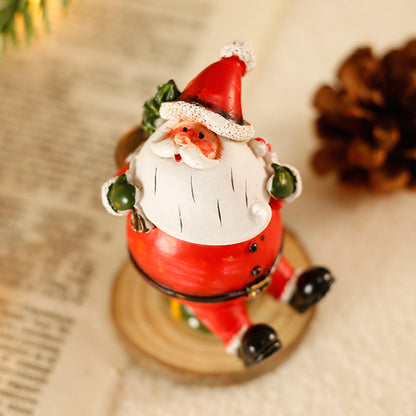 Desktop Christmas decorations and mini ornaments arranged for a festive display