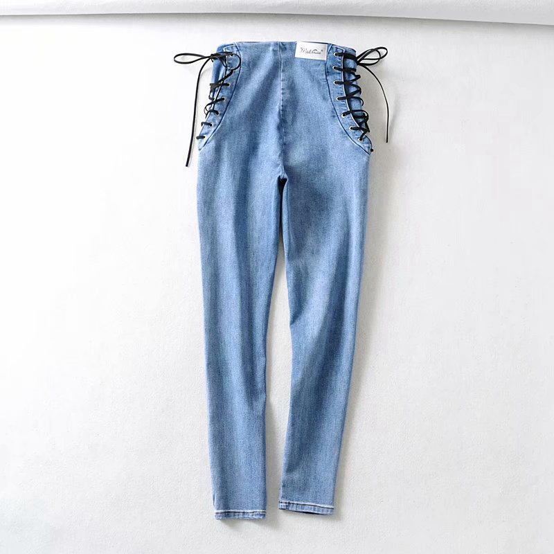 BackUpMyFilesNow® chic high waist denim jeans with classic blue wash and stylish fit, displayed on a model.