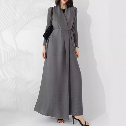 Graceful fashionable long trench coat for women, full-length tailored outerwear in a classic silhouette