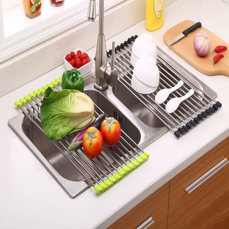 Folding kitchen drain sink rack in stainless steel, shown expanded over a sink