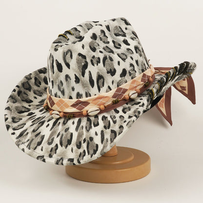 Leopard-print western cowboy hat with wide brim and structured top hat design