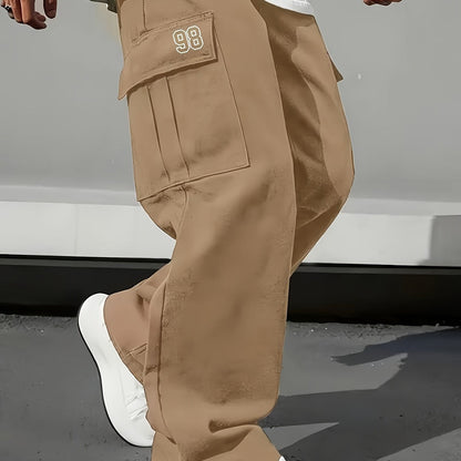 Men's loose fit work pants with drawstring waist, shown in a neutral color
