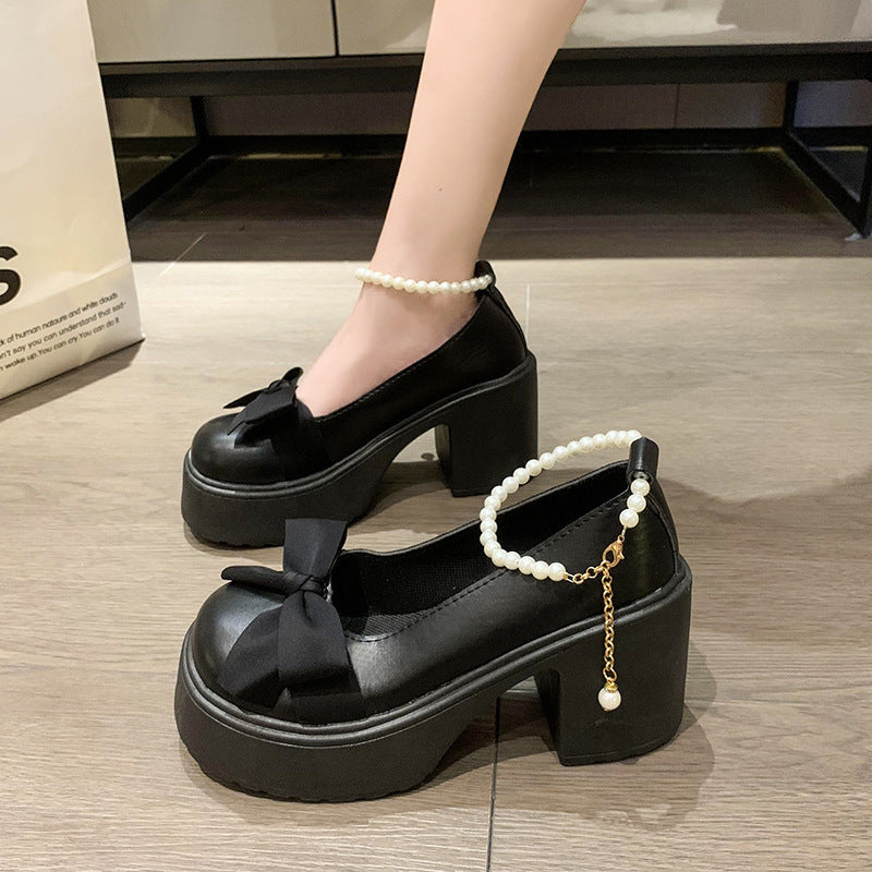Pearl bow high-heeled leather shoes with elegant bow detail and pointed toe