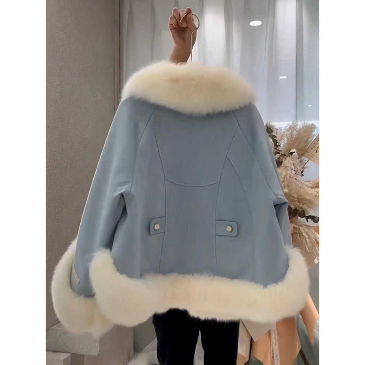 Women’s one-piece patchwork fur coat with a textured multicolor design and long sleeves