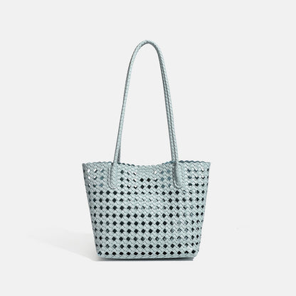 Stylish women's vacation shoulder handbag tote with under-arm design and spacious silhouette