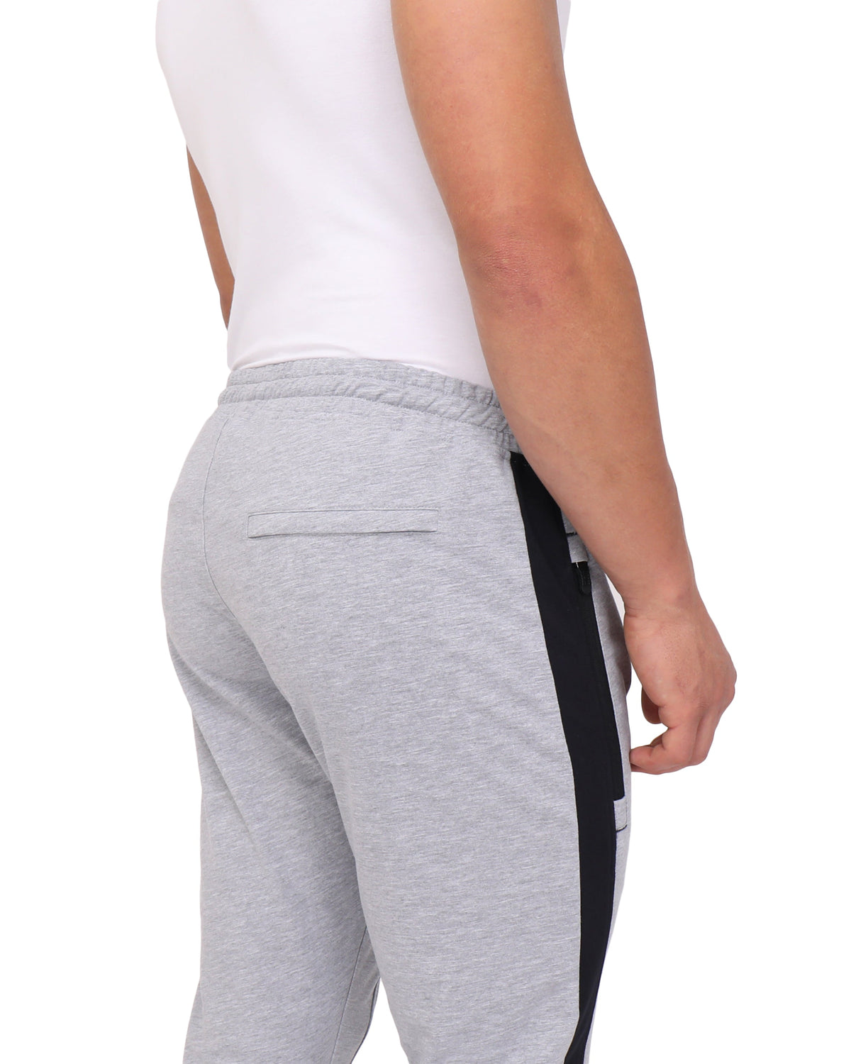 Back close-up of SCR Sportswear Infinite Flex Tall Fit men's joggers sweatpants showing waistband and back pocket details.