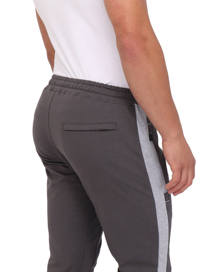 Close-up of the back of SCR Sportswear Infinite Flex Tall Fit men's joggers sweatpants showing fabric texture and stitching details.