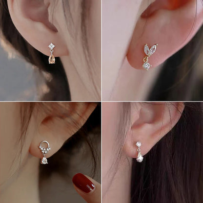 Korean fashion women's earrings with leaf design, rhinestones, and tassel charm, suitable for wedding or party jewelry.