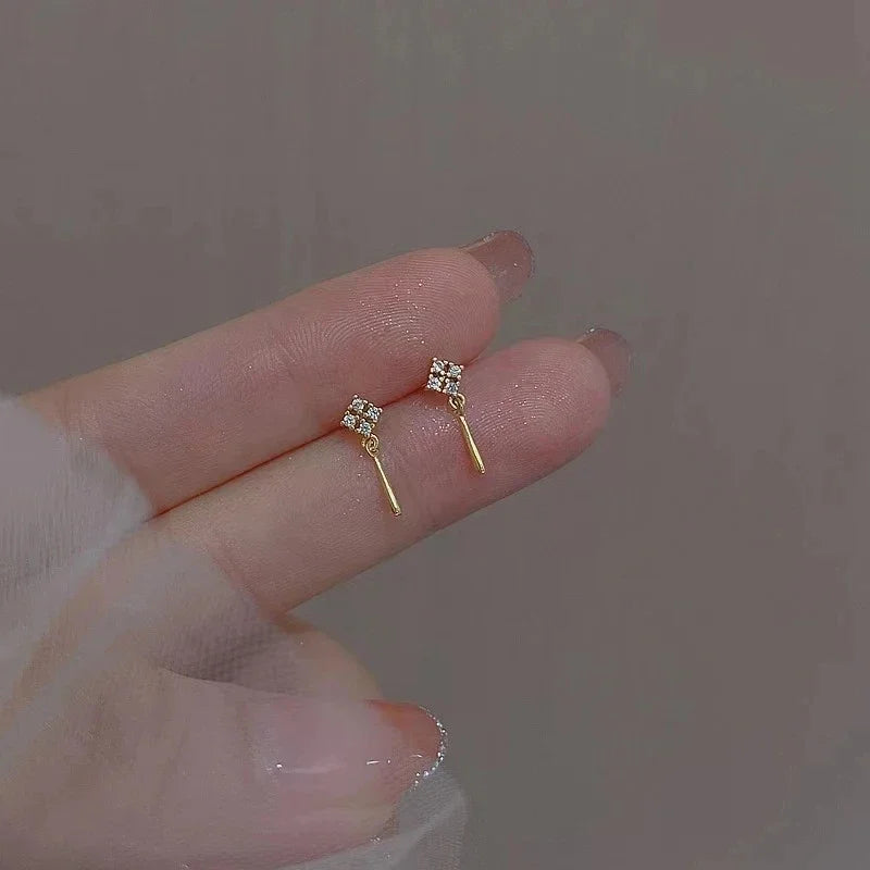 Korean fashion student leaves earrings for women with rhinestone tassel charms, suitable for wedding or party jewelry.