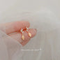 Korean fashion student leaves earrings for women with rhinestone tassel charms, perfect for weddings and party jewelry.