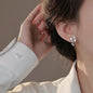 Korean fashion women's earrings with leaf design, rhinestones, tassel charms, perfect for weddings and parties.
