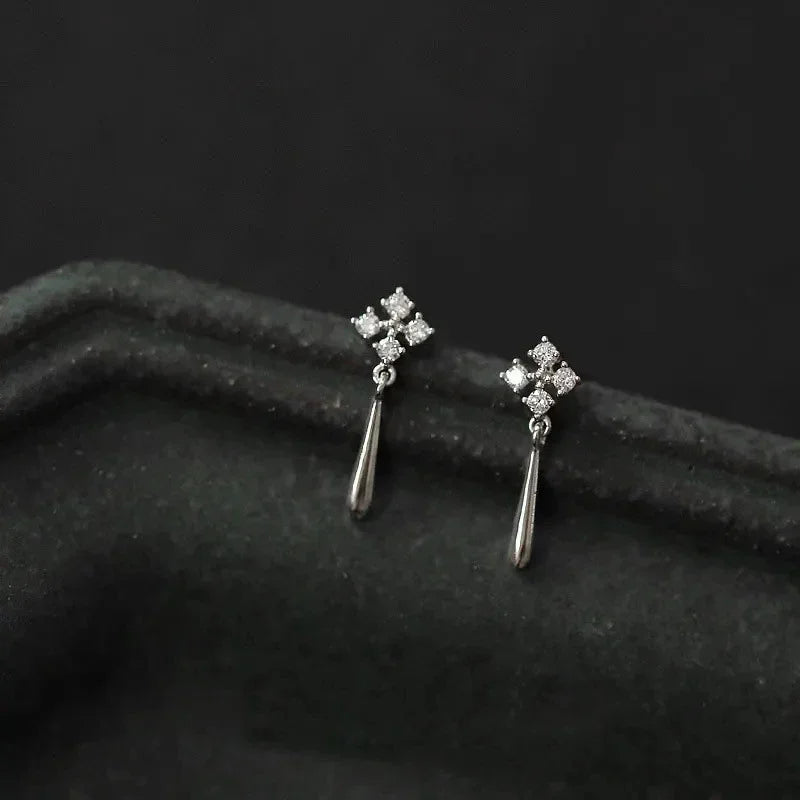 Korean fashion female earrings with leaf design, rhinestones, and tassel charms, perfect for wedding or party jewelry.