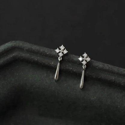 Korean fashion female earrings with leaf design, rhinestones, and tassel charms, perfect for wedding or party jewelry.