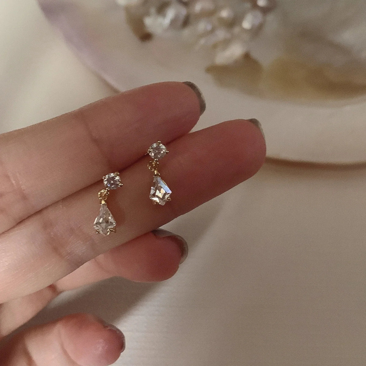 Korean fashion student leaves earrings for women with rhinestone tassel charms, perfect for weddings and special occasions.