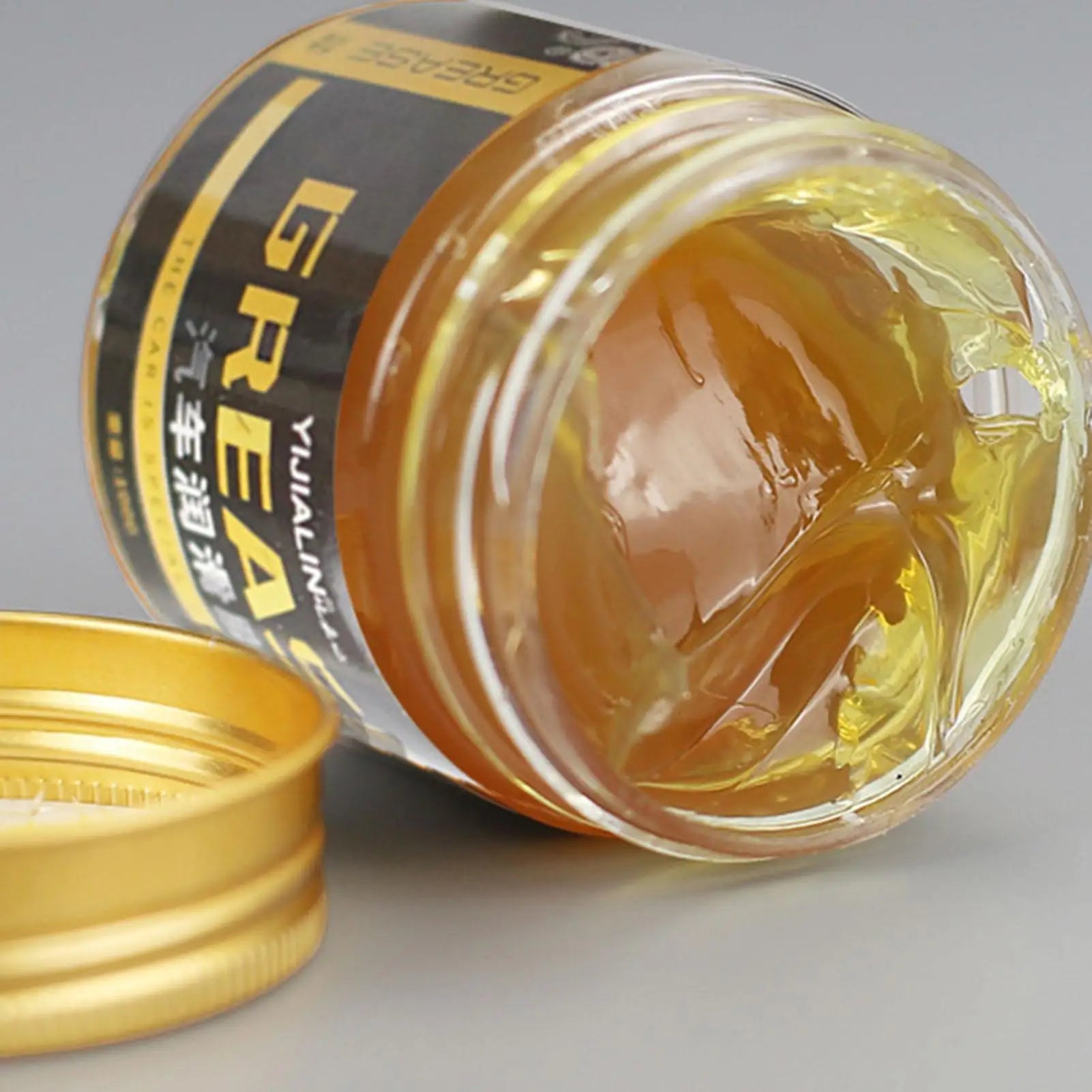 Automotive grease 100g by BACKUPMYFILESNOW.COM, high-temperature, wear-resistant lubricating grease for automotive applications.